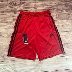 red adidas shorts